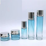 Сопствени бренд Ски Блуе Градиент Пусх Довн Ессенце боца крема са висококвалитетним прилагођеним